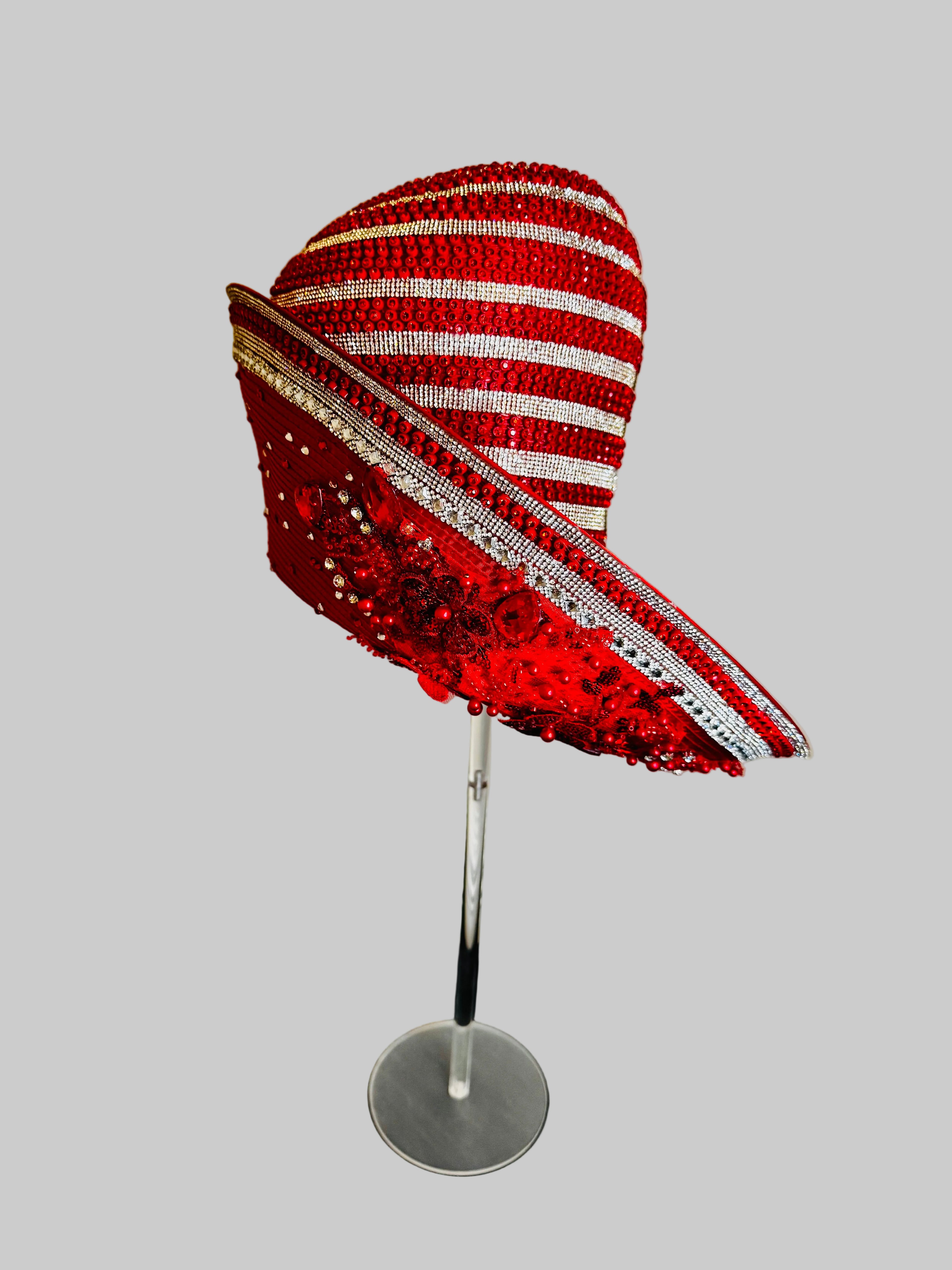 Red embellished church hat with flexible brim to showcase candy cane jewel in the