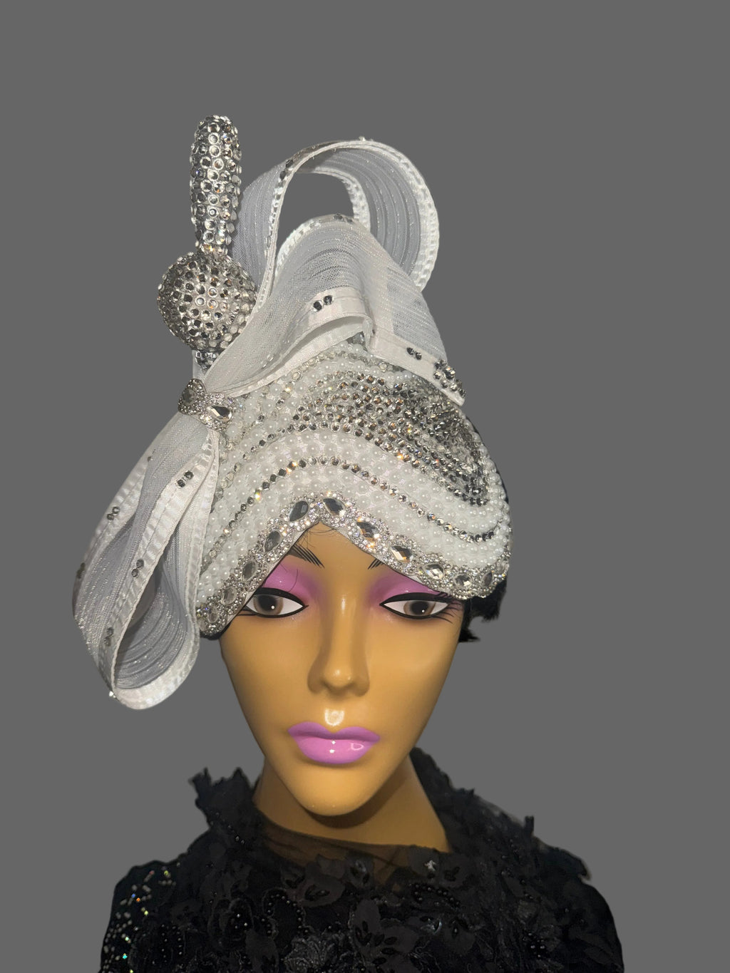 white and silver fascinator embellished v hat