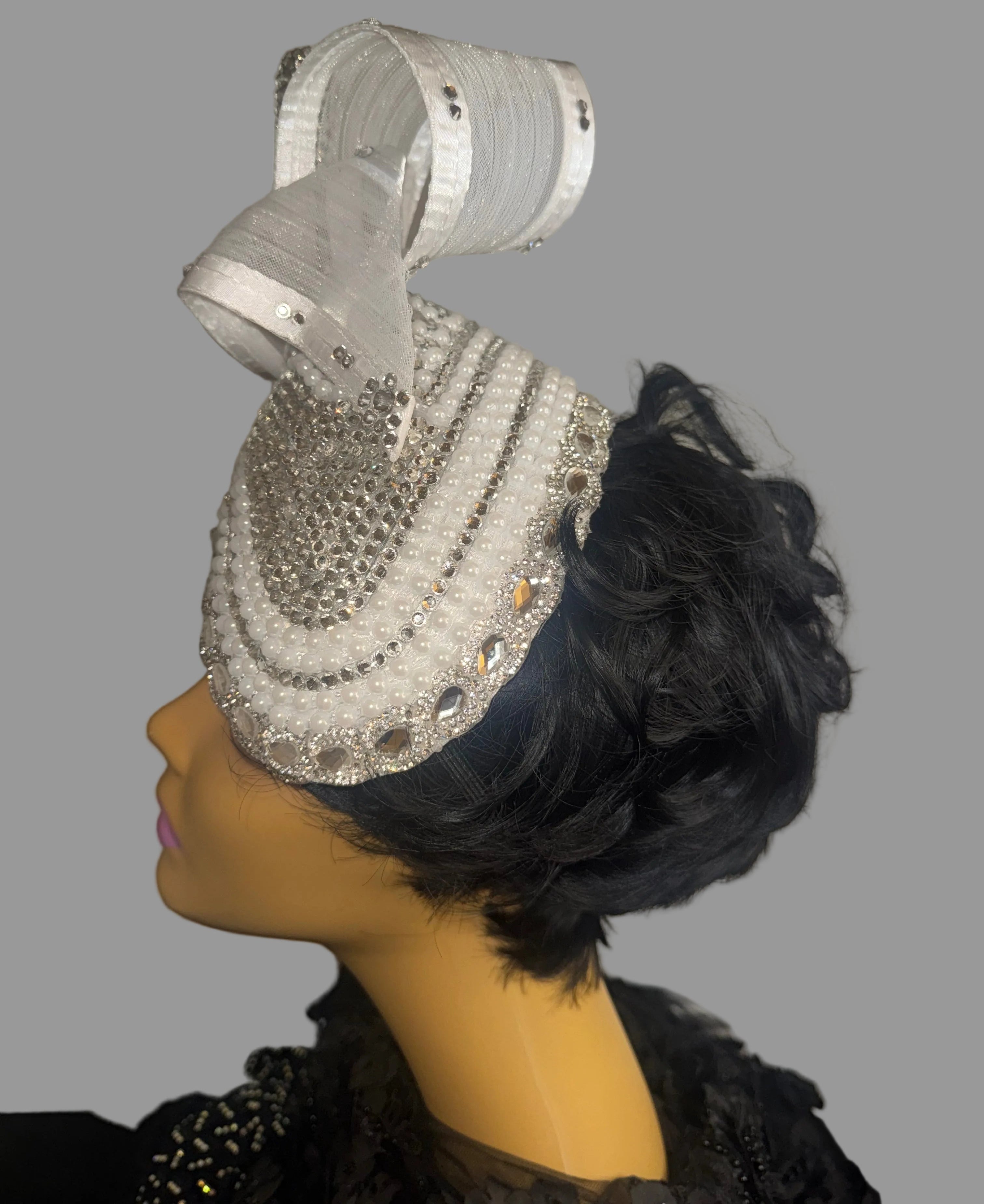 white and silver fascinator embellished v hat