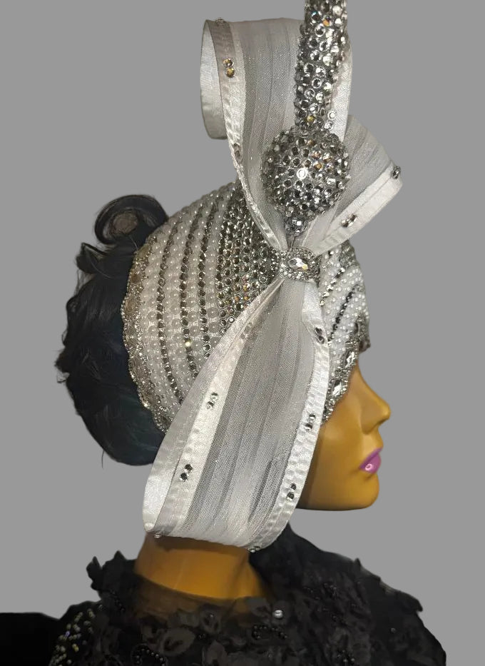 white and silver fascinator embellished v hat